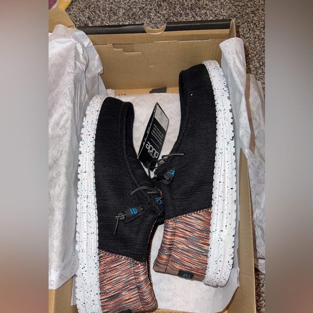 Men’s size 9 Hey Dudes. Brand new still in the box. $45